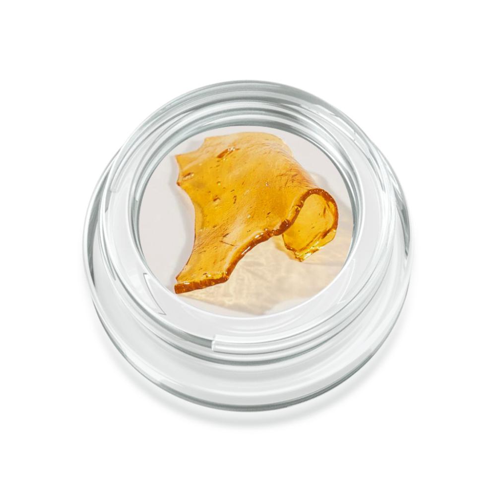 Cannabis shatter concentrate in a glass jar