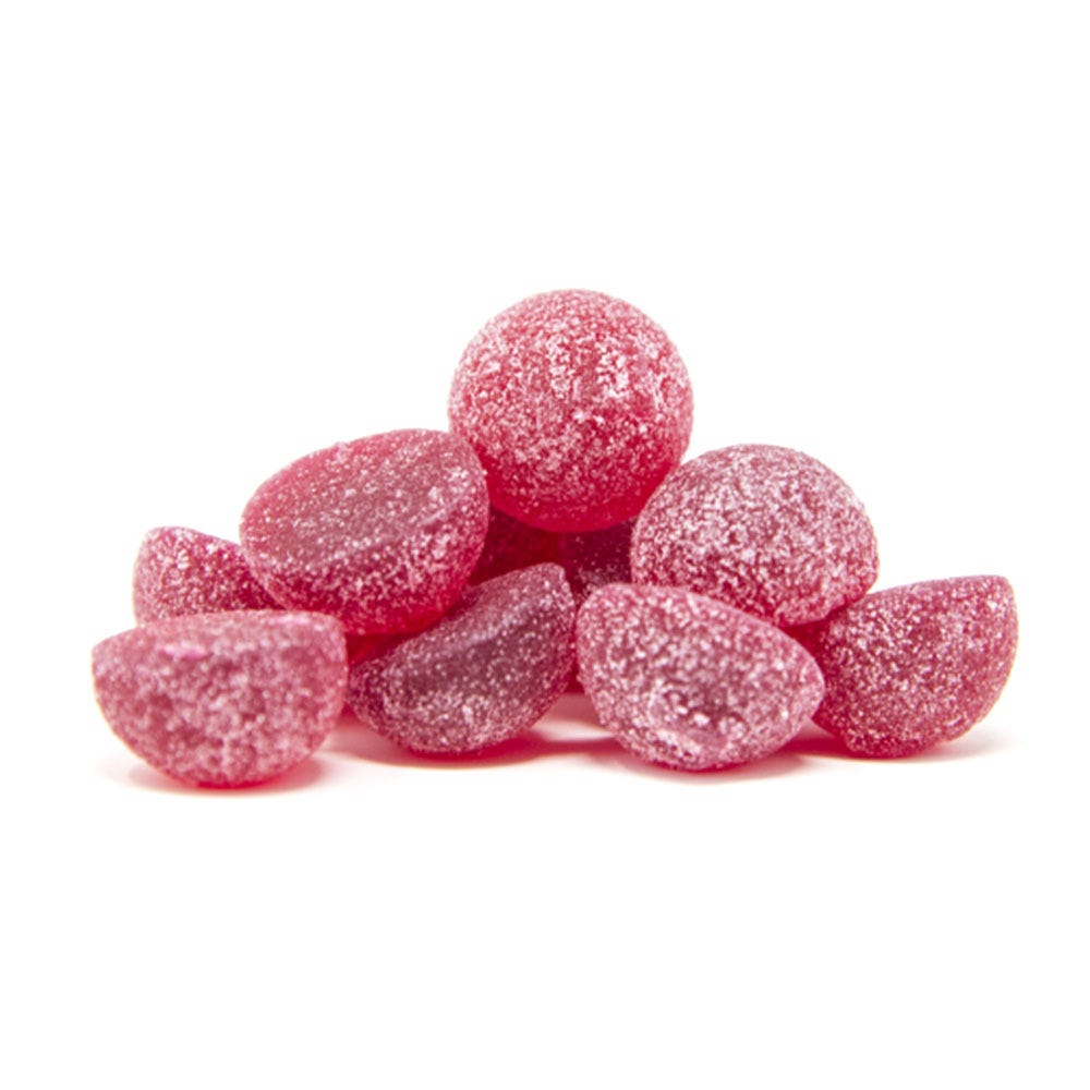 Pile of cannabis edibles on a white background