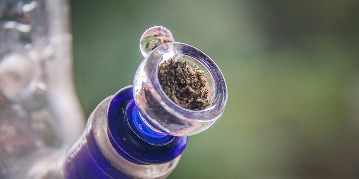 Cannabis flower in the bowl of a marijuana bong